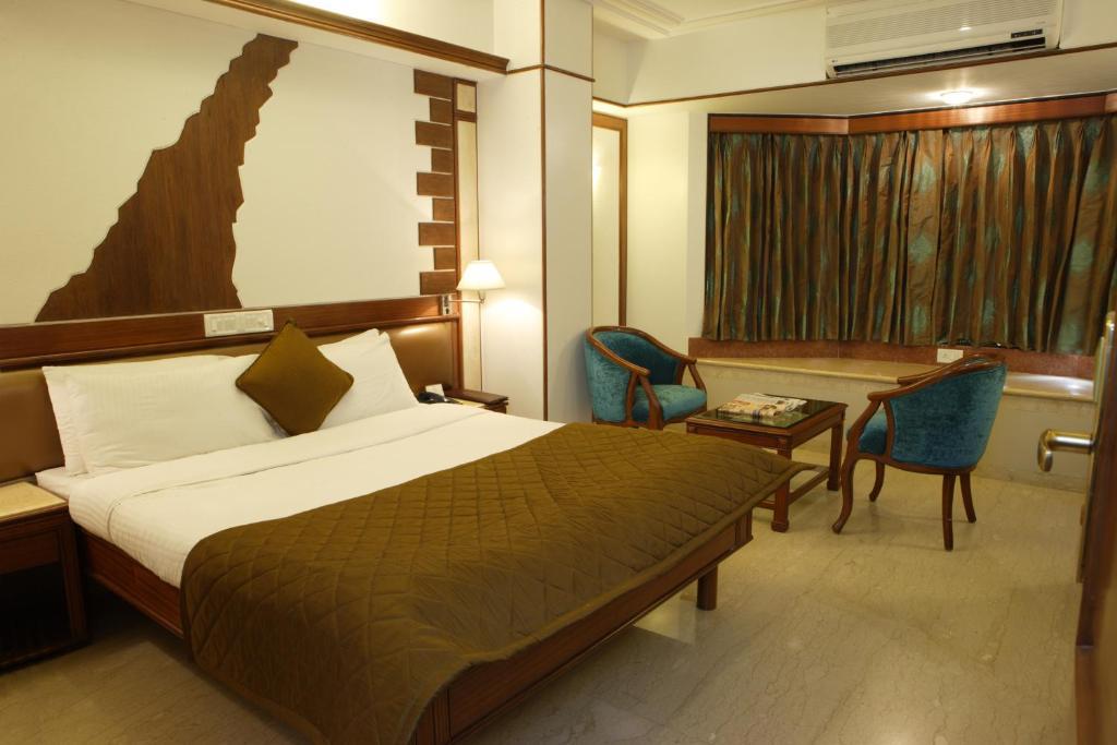 Regal Enclave Hotel Bombaim Quarto foto
